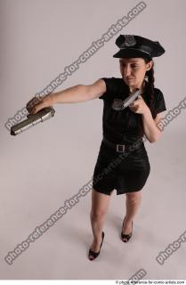 12 NIKITA POLICEWOMAN STANDING POSE WITH TWO GUNS